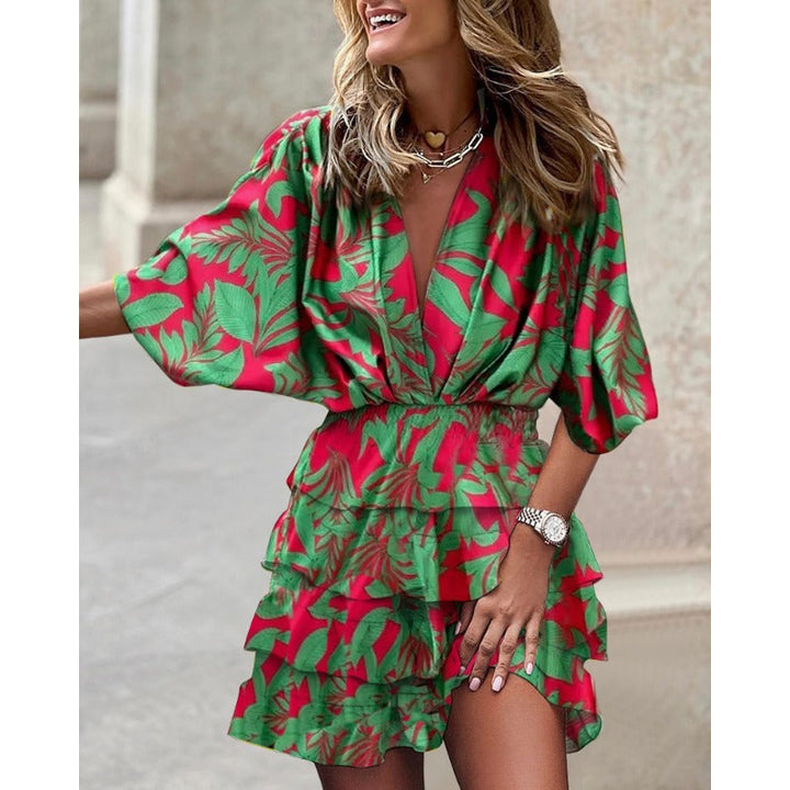 Stijlvolle midi dames zomerjurk met V-hals en trendy vleermuismouwen, voor een comfortabele pasvorm.