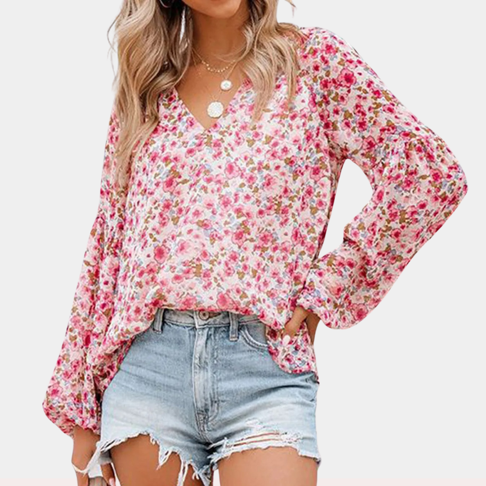 "Damesblouse met lange mouw en bloemenprint, ideaal voor de zomer, elegante look in roze, wit of groen."