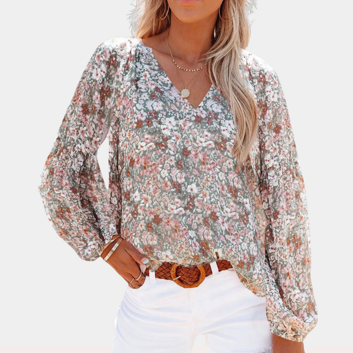 "Damesblouse met lange mouw en bloemenprint, ideaal voor de zomer, elegante look in roze, wit of groen."