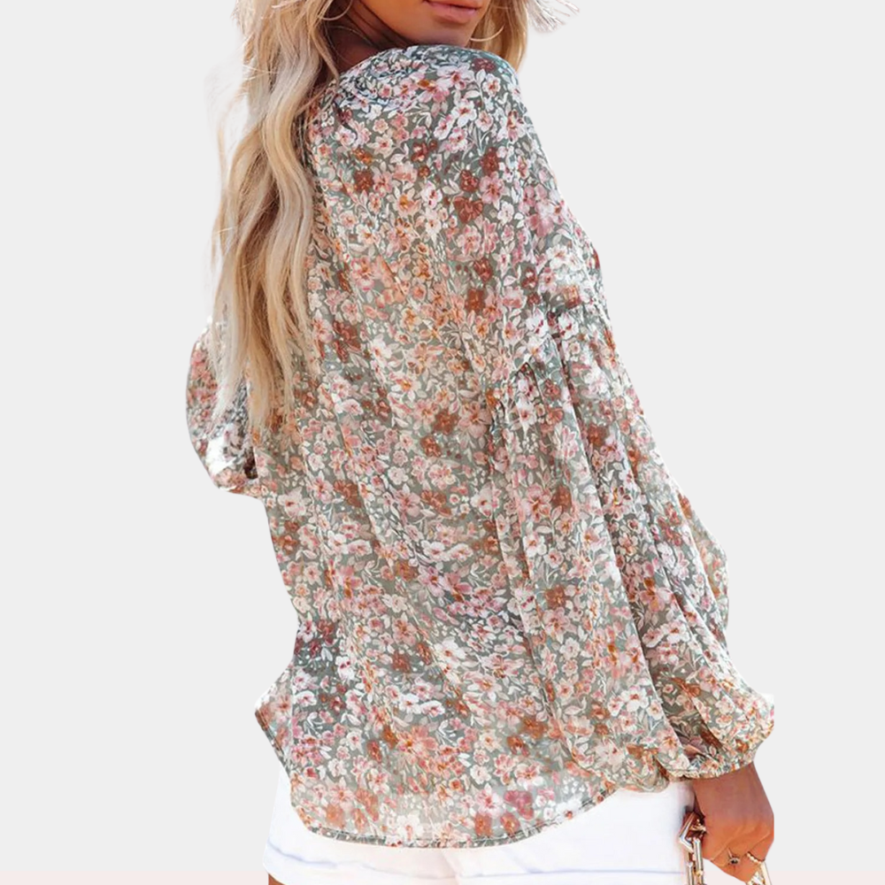 "Damesblouse met lange mouw en bloemenprint, ideaal voor de zomer, elegante look in roze, wit of groen."