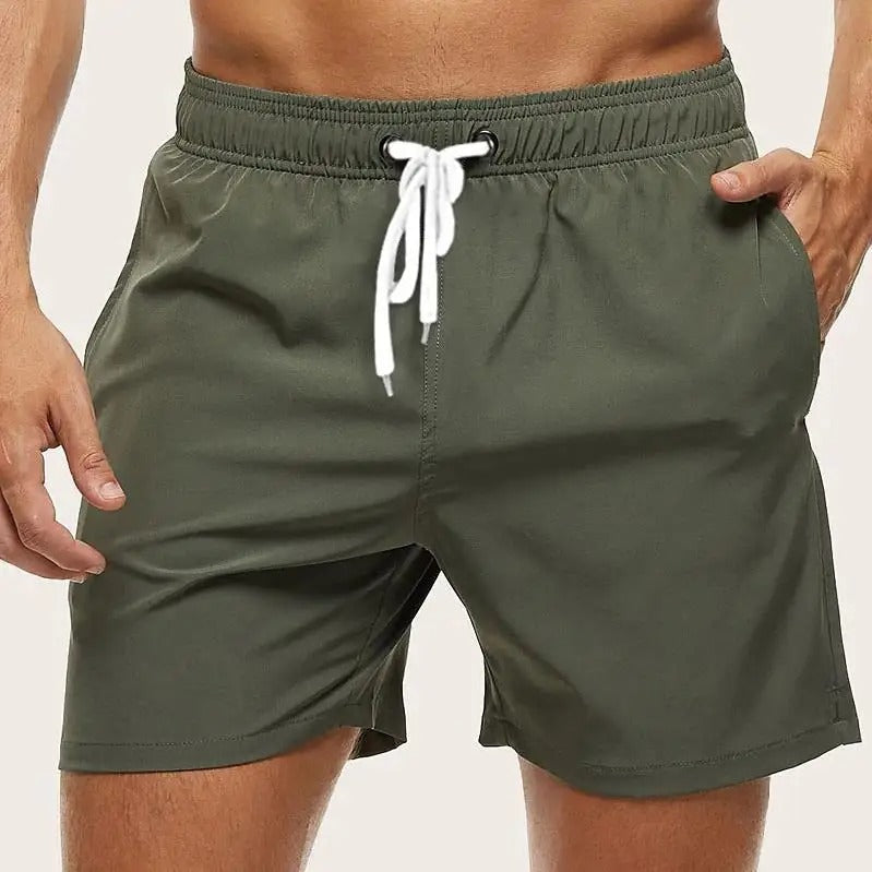 Actieve heren badmode: sneldrogende zwembroek met trekkoord, ideaal voor zwemmen, sport en strandvakantie.