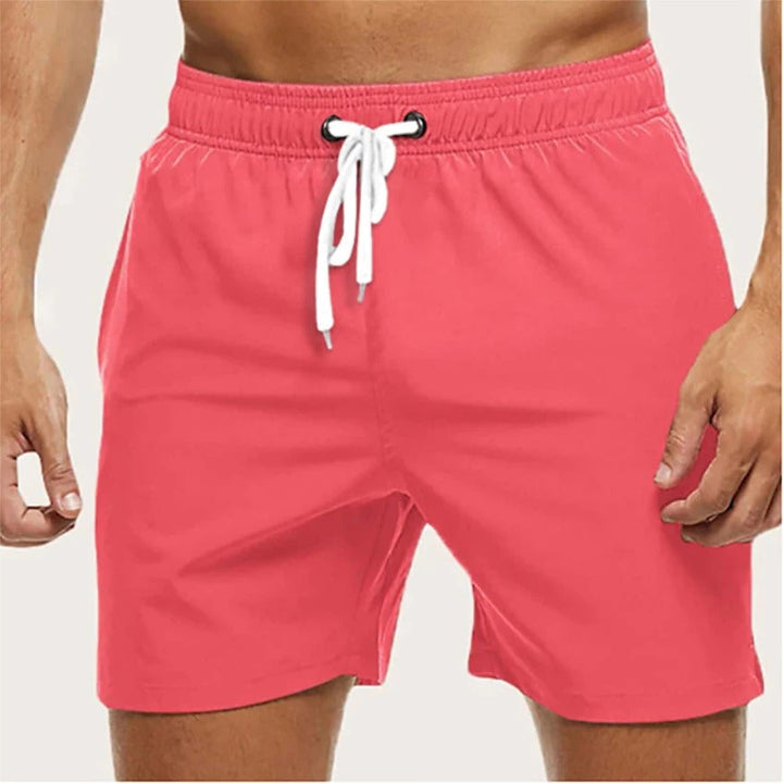 Heren sneldrogende zwembroek met elastische taille en trekkoord, ideaal voor strand en zwemmen in de zomer.