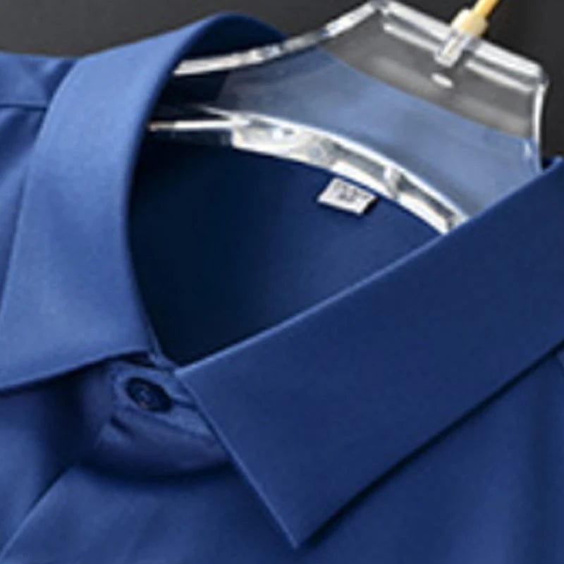 Klassiek blauw slim fit overhemd. Kreukvrij en comfortabel, perfect voor business en veelzijdige herenmode.