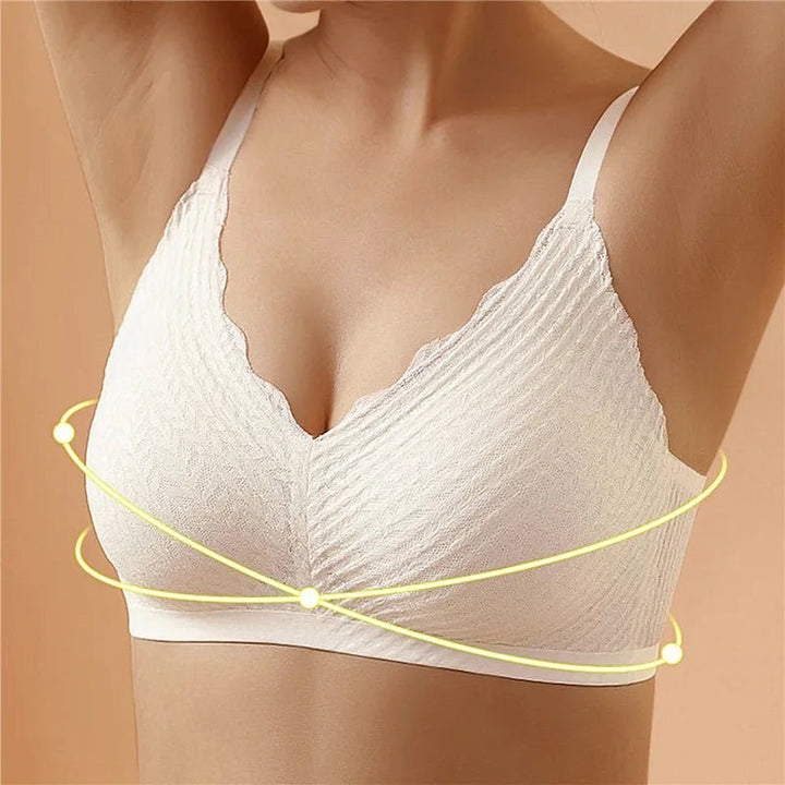 "Draadloze naadloze kanten bh voor ultiem comfort en elegante look in zachtroze met verstelbare bandjes."