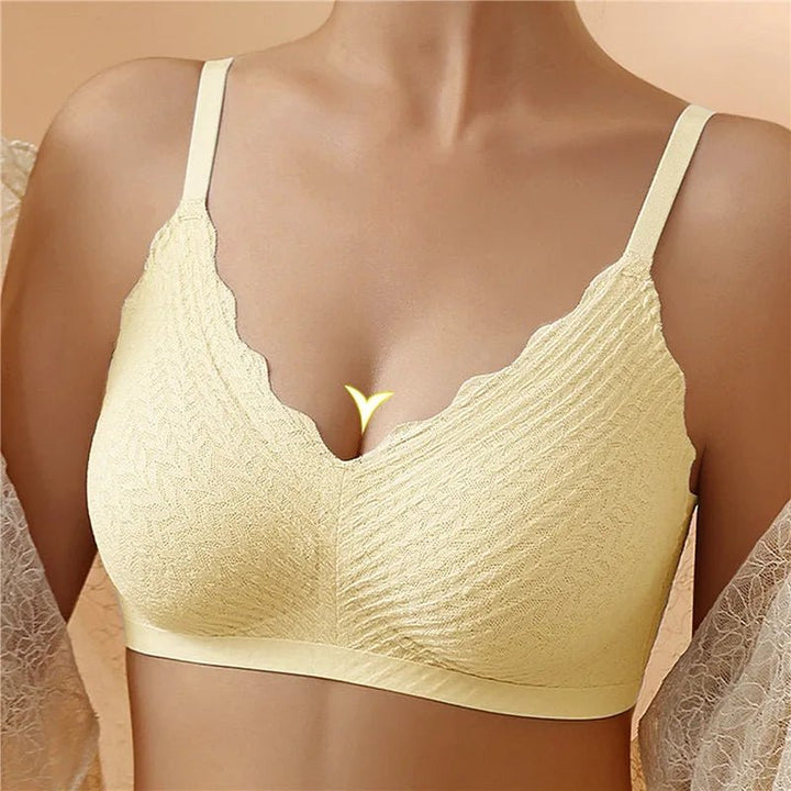"Draadloze naadloze kanten bh voor ultiem comfort en elegante look in zachtroze met verstelbare bandjes."