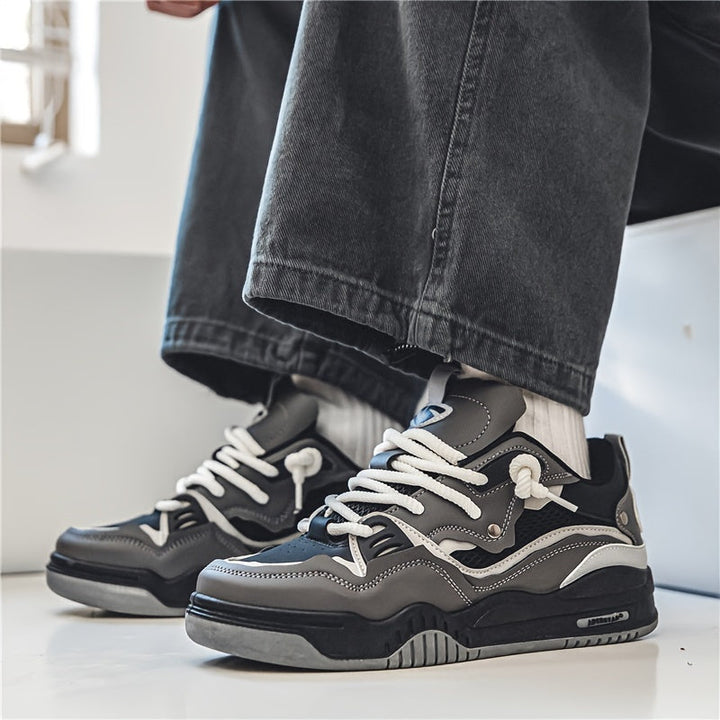 "Dynamisch ontworpen Ryker sneakers, ademend en comfortabel voor moderne mannen; sportieve, eigentijdse look."