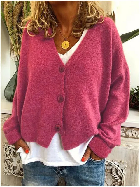 "Elegant katoenen dames vest met knopen, tijdloze stijl, zacht textuur, lange mouwen, perfect voor elke gelegenheid."