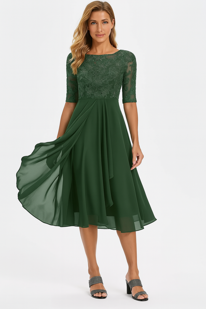 Elegante groene midijurk, perfect als avondjurk of bruiloftsgast jurk, met sierlijk bovenstuk en wijde rok.