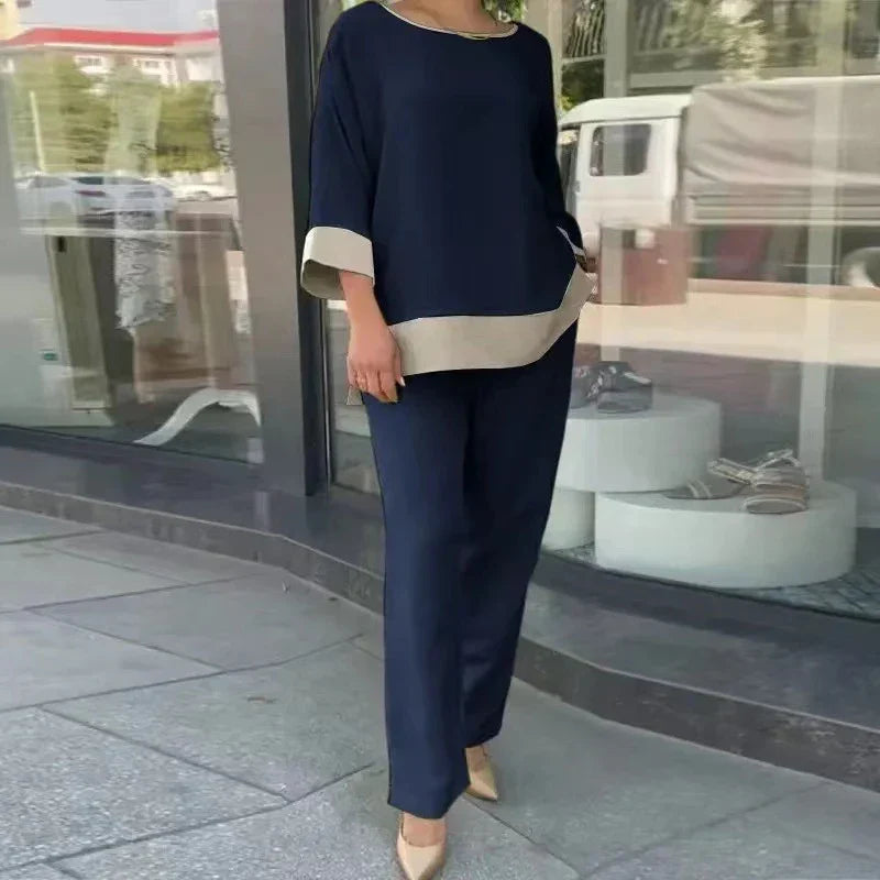 Groene dames co-ord set met rechte broek. Stijlvolle en luchtige broekpak voor een modieuze lente outfit.