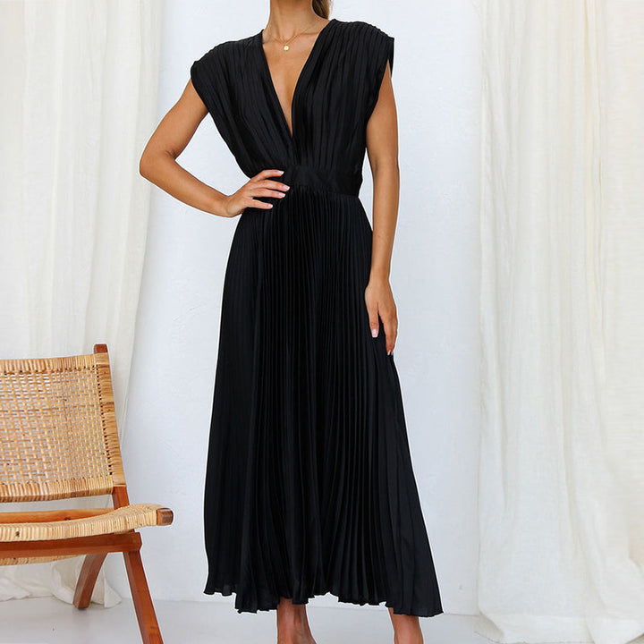 Feestelijke zomerjurk voor dames: mouwloze maxi jurk met V-hals en een vloeiende pasvorm.