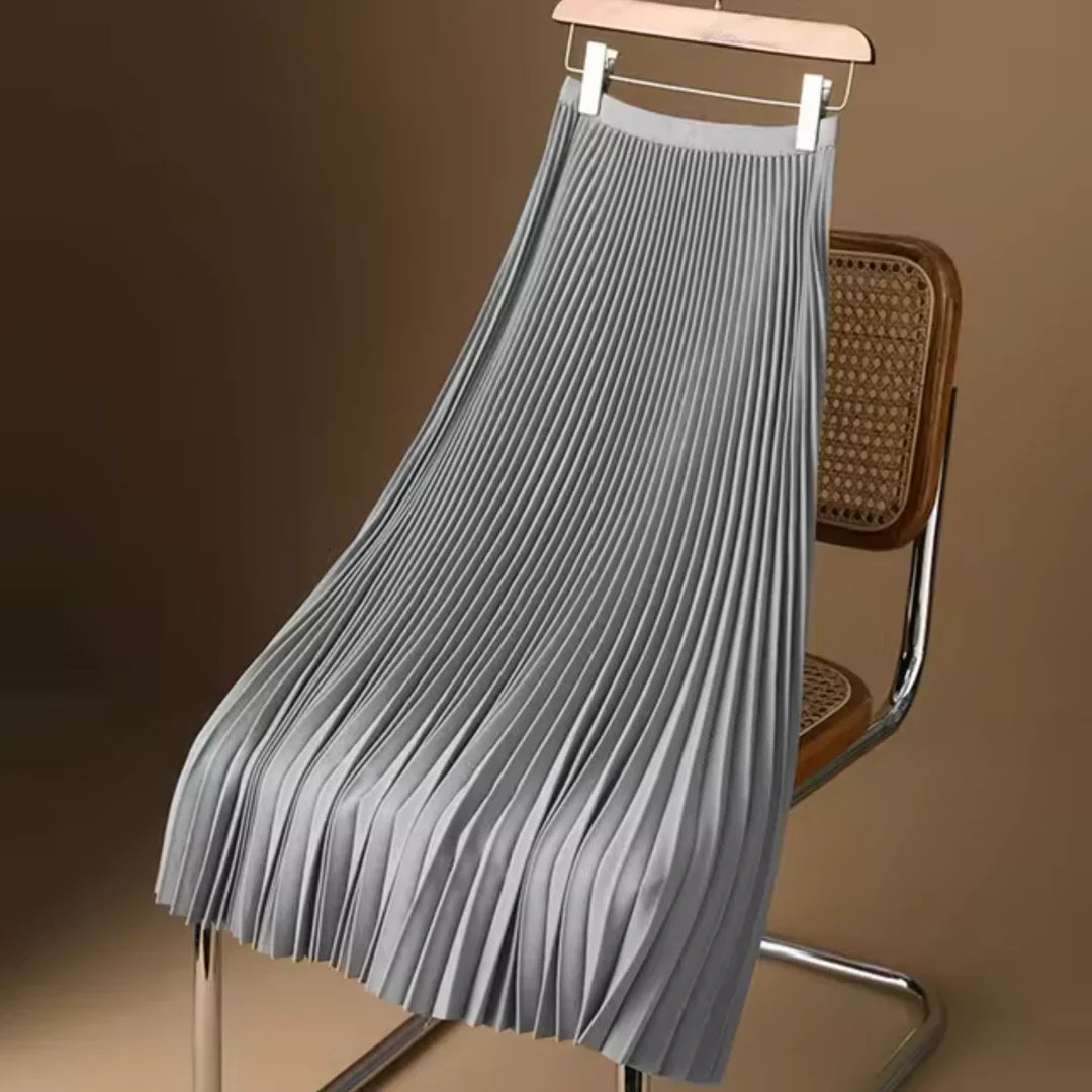 Comfortabele en modieuze dames plooirok, midi lengte, perfect voor een stijlvolle alledaagse look.
