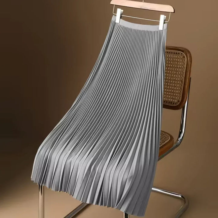 Comfortabele en modieuze dames plooirok, midi lengte, perfect voor een stijlvolle alledaagse look.