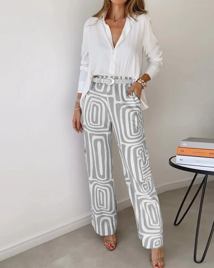 "Elegante dames set met geometrische print in beige, grijs en oranje; relaxed-fit shirt en broek voor casual en chic events."