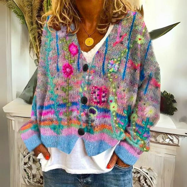 Elegante dames trui met levendige bloemenprint, ideaal voor comfortabele en stijlvolle vrouwenkleding.
