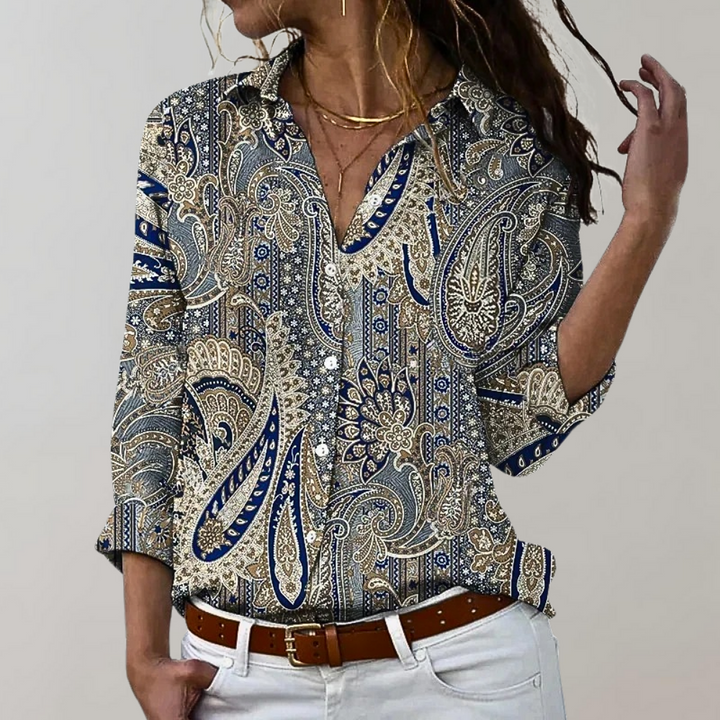 "Elegante damesblouse in gouddkleur, subtiele slim fit, katoenen mix, ideaal voor zowel chique als casual gelegenheden."