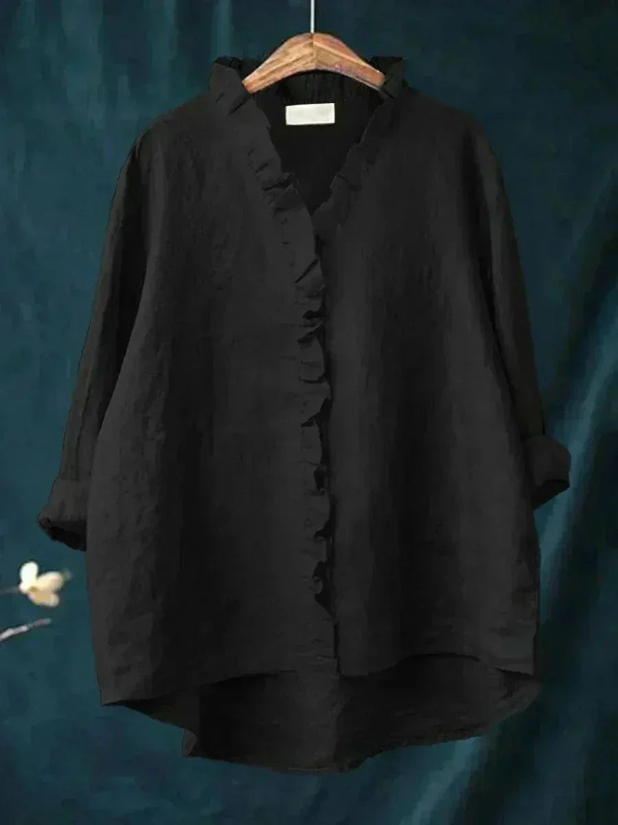 Veelzijdige damesblouse met V-hals, lange mouwen en ruches, geschikt voor zowel casual als elegante outfits.