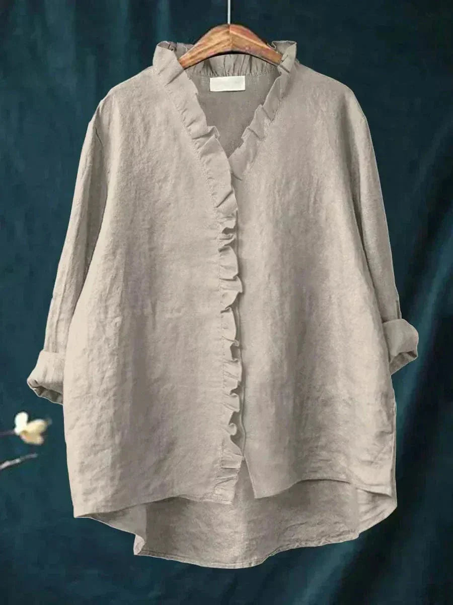 Comfortabele damesblouse met zachte stof, elegante V-hals, lange mouwen en delicate ruches voor casual stijl.
