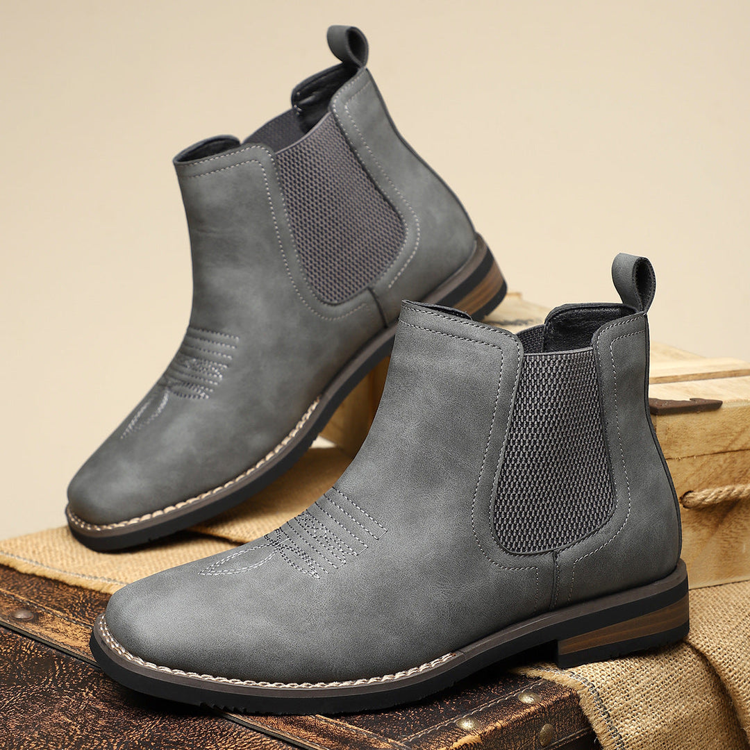 Comfortabele heren Chelsea boots met elastische zijpanelen. Instapmodel in westerse stijl, ideaal voor mannenmode.