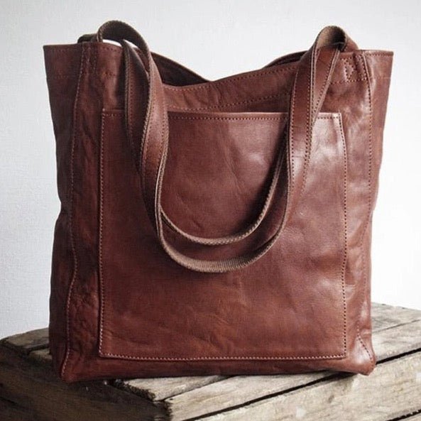 Elegante, leren tas voor dames, chique uitstraling, vlekbestendig interieur, perfecte toevoeging aan elke garderobe.