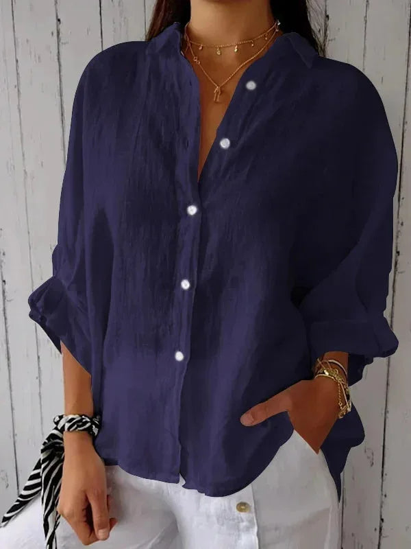 "Elegante linnen damesblouse met V-hals en strikje, luchtige katoen-linnenmix, vrouwelijk silhouet, veelzijdig design."