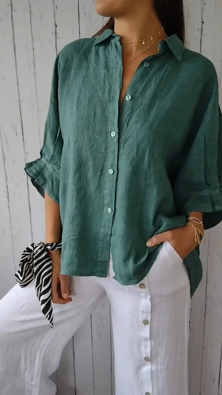 "Elegante linnen damesblouse met V-hals en strikje, luchtige katoen-linnenmix, vrouwelijk silhouet, veelzijdig design."