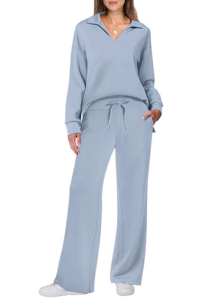 "Elegante loungewear set voor dames met off-shoulder sweater en perfect passende broek, trendy en comfortabel zichtbaar."