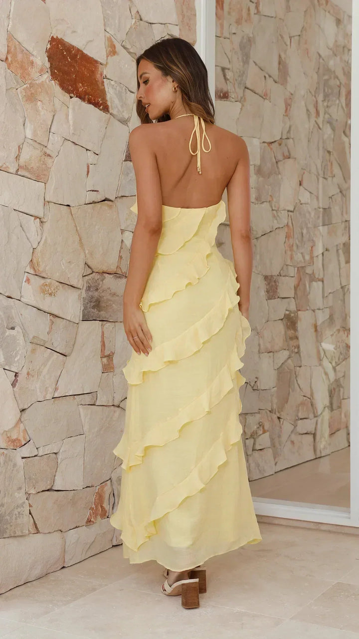 "Elegante maxi ruffle jurk in blauw, stijlvolle details voor speciale gelegenheden zoals bruiloften en gala's, damesmode"