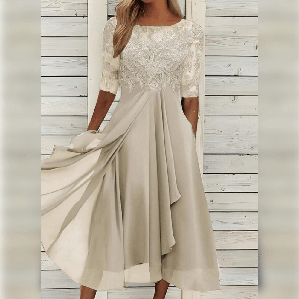 "Elegante midi-jurk in kant en chiffon met romantische kanten bovenkant en halfdoorschenen mouwen voor speciale gelegenheden.