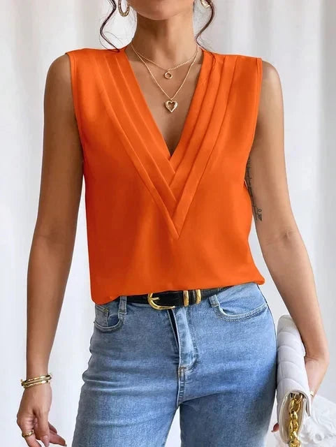 Zomerse damesblouse V-hals mouwloos, luchtig en chic voor elke gelegenheid.
