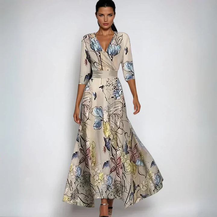 Elegante Noa luxe jurk met bloemenprint en verstelbare tailleband, zijaanzicht, ideaal voor formele en casual gebruik.