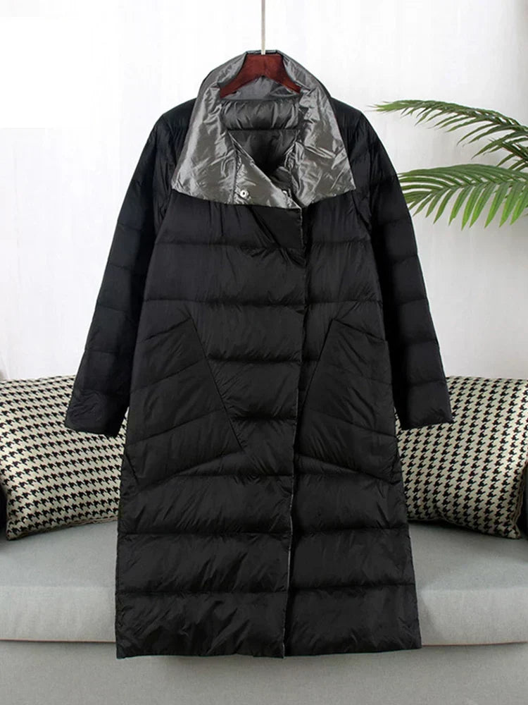 "Elegante Nordiva winterjas met geruit patroon, wolmix, vooraanzicht. Perfecte warmte en stijl voor koud weer."
