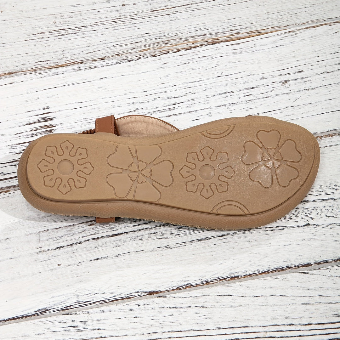 "Elegante orthopedische damessandaal met kralen en verstelbare bandjes, biedt comfort en mode voor een lange zomerdag."