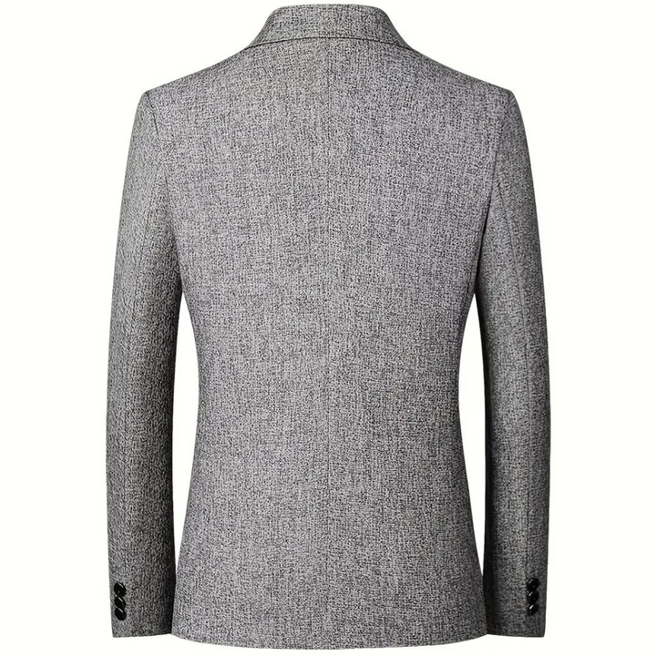 "Elegante RAYAN herenblazer in blauw met reverskraag, klepzakken en knopen voor stijlvolle looks. All-season stijlbasic."