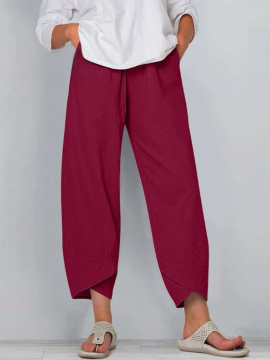 "Elegante Silvia Linnen Broek met relaxte pasvorm, elastische taille en zijzakken, perfect voor casual en comfort."