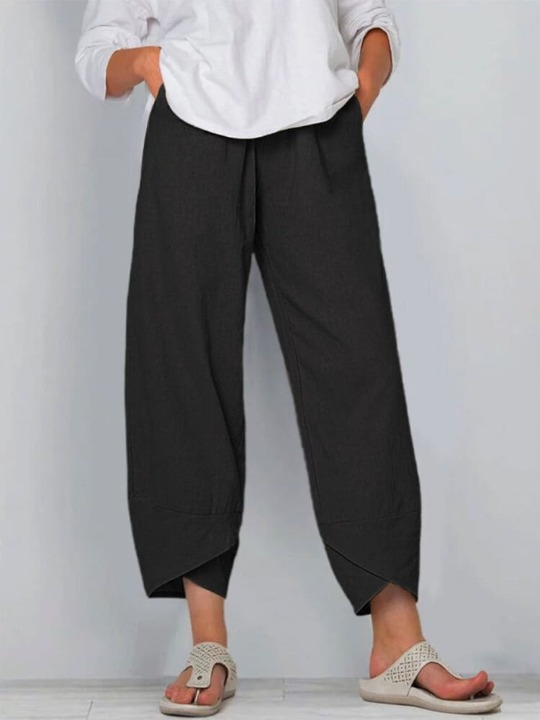 "Elegante Silvia Linnen Broek met relaxte pasvorm, elastische taille en zijzakken, perfect voor casual en comfort."