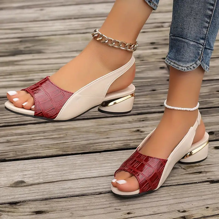 "Elegante slingback sandalen met open neus en krokodillenstructuur, luxe uitstraling en comfortabele pasvorm voor dames."