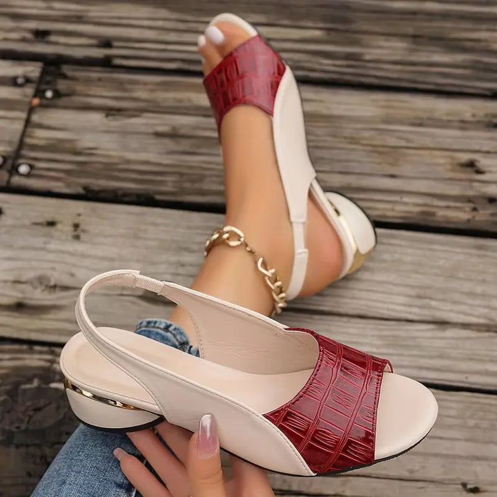 "Elegante slingback sandalen met open neus en krokodillenstructuur, luxe uitstraling en comfortabele pasvorm voor dames."