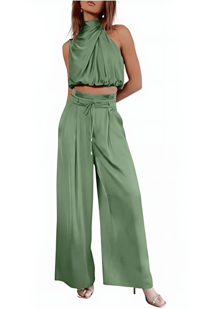 Wijdvallende broek van de comfortabele tweedelige dames set, soepel vallend voor zomerse dagen.