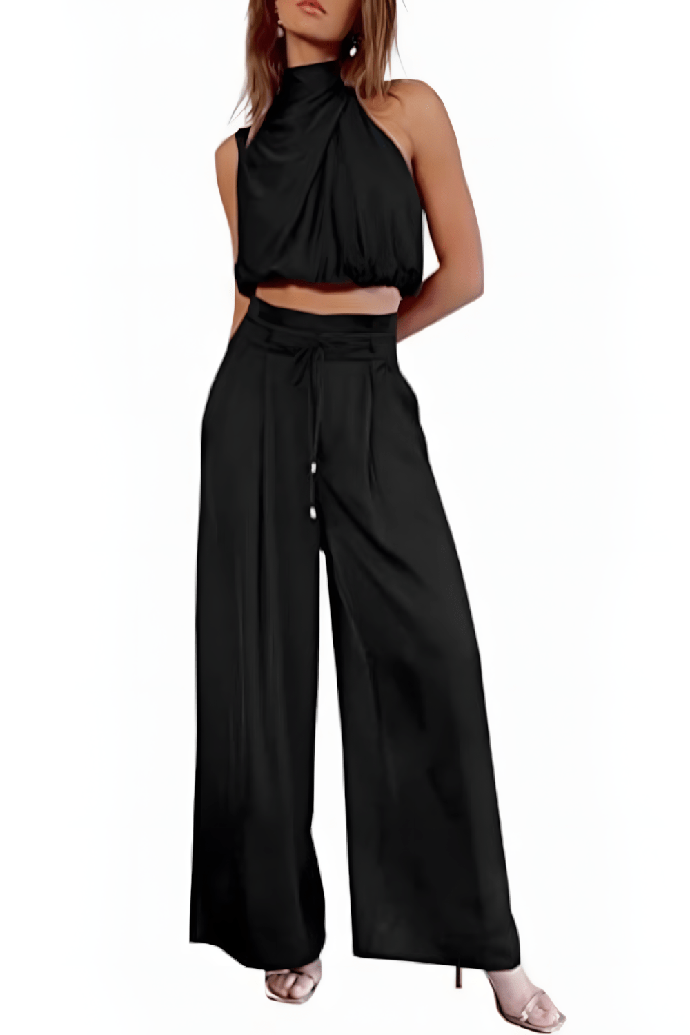 Detail van de mouwloze top uit de elegante tweedelige set voor dames, effen kleur en stijlvol.