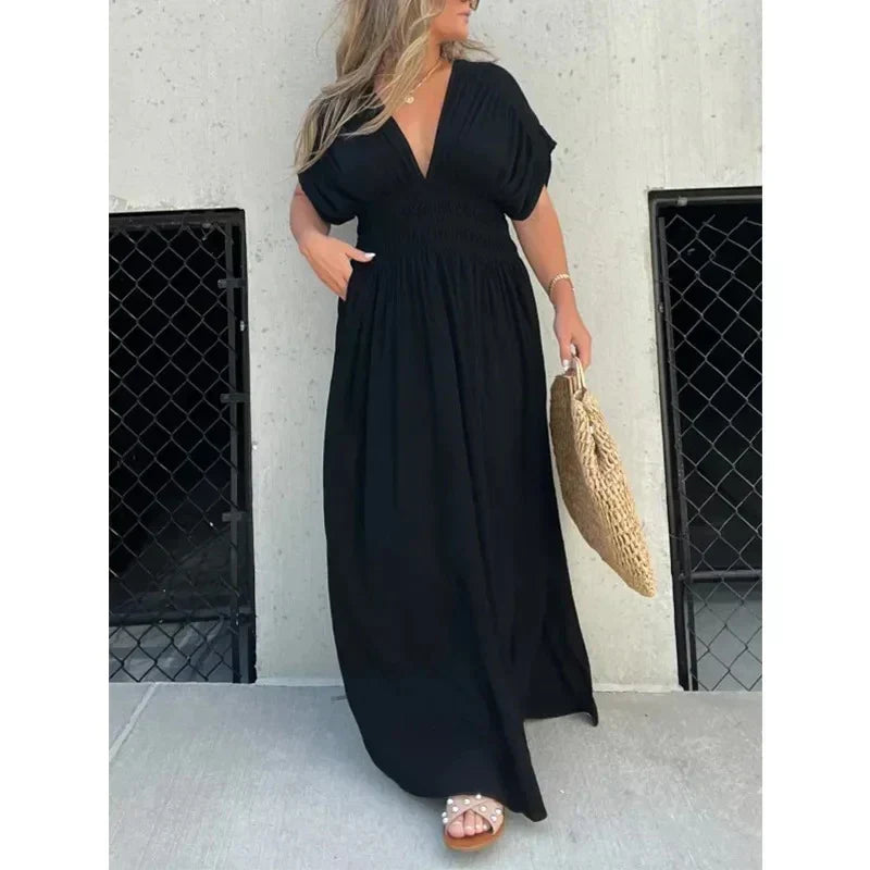 Stijlvolle maxi feestjurk voor dames met V-hals en hoge split. Perfect voor zomeravonden en speciale gelegenheden.