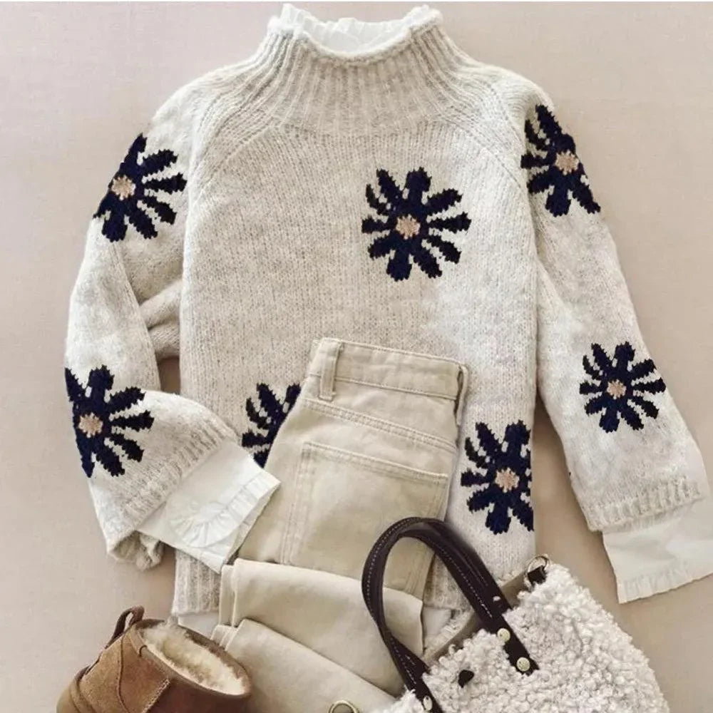 Elegante warme dames trui met bloemenpatroon en hoge hals, ideaal voor herfst- en wintermode.