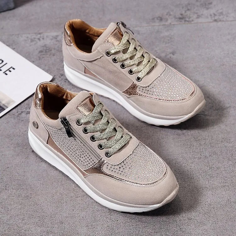 "Ergonomische damessneakers in grijs met ademende materialen, bieden stijl en comfort voor dagelijks gebruik."