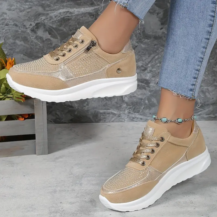 "Ergonomische damessneakers in grijs met ademende materialen, bieden stijl en comfort voor dagelijks gebruik."
