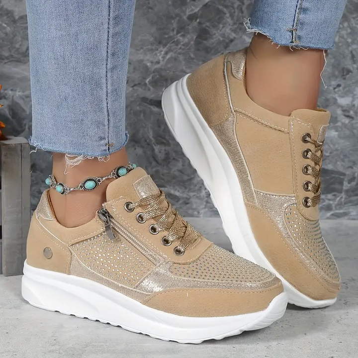 "Ergonomische damessneakers in grijs met ademende materialen, bieden stijl en comfort voor dagelijks gebruik."