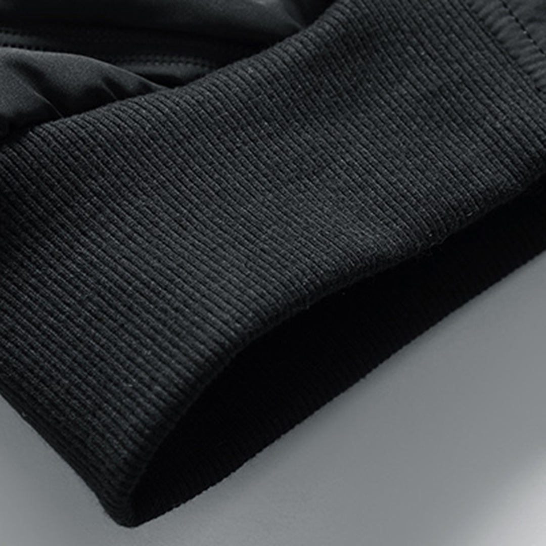 Wit/grijs gewatteerd herenjack; comfortabele casual bovenkleding voor de lente en herfst.