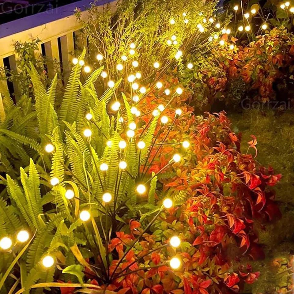 "Flexibele LED tuinverlichting met vuurvliegjes effect, op zonne-energie, buigbare stelen, warm wit licht, waterbestendig IP6