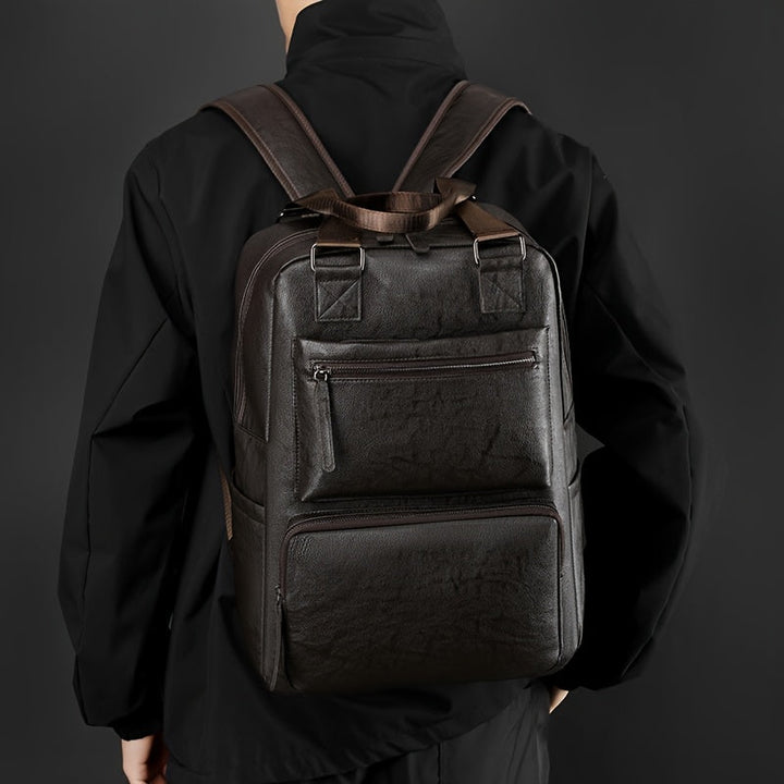 Bruine heren rugzak met handige vakken en verstelbare banden