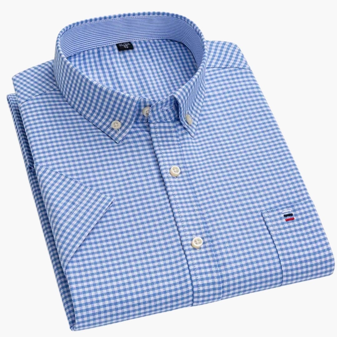 Klassiek geruit heren overhemd met korte mouwen; een must-have voor kantoor en zomerse gelegenheden.