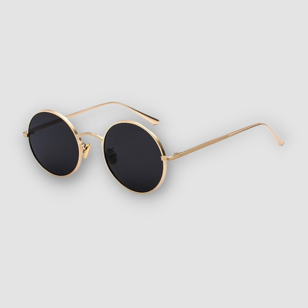 Heren vintage zonnebril met rond metalen montuur, retro stijl, UV400 bescherming.