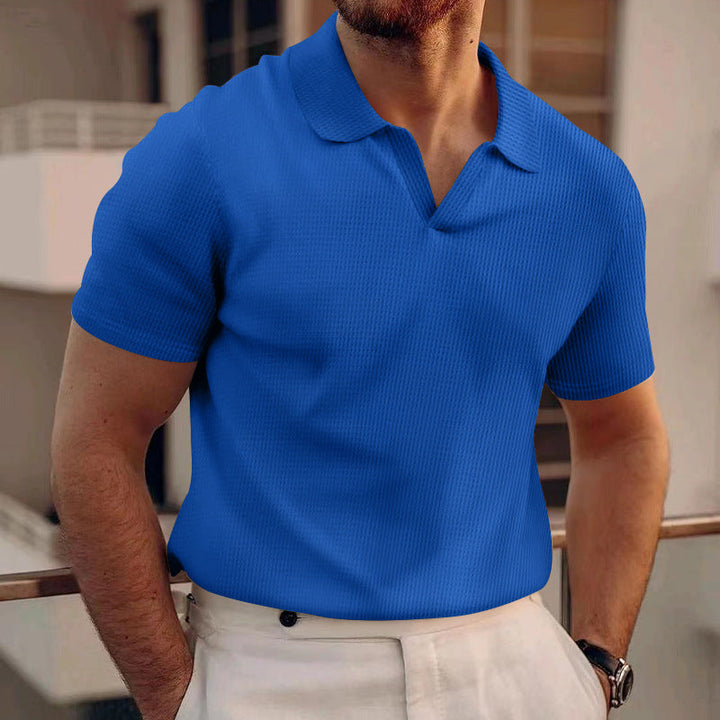 Klassiek heren polo shirt met comfortabele korte mouwen en stijlvolle grid textuur, ideaal voor casual zomer outfits.